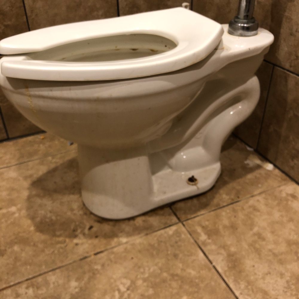 7-Eleven - a toilet in a tiled bathroom - Gas Stations Near Me - Simpsonville, South Carolina 7-Eleven - a toilet in a tiled bathroom - Gas Stations Near Me - Simpsonville, South Carolina