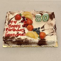 White cake with peach fruit mixed into the filling. Delicious! Not too sweet