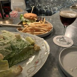 Caesar salad and burger Caesar salad and burger