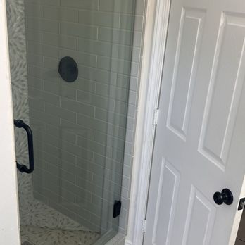 North County Glass - Swinging Shower glass door with black finishes - Glass & Mirrors Near Me - Orange, California