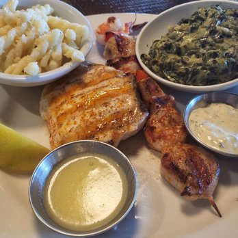 The Original Fish Company - Mesquite grilled halibut, scallops, shrimp with sides of garlic butter pasta and artichoke spinach casserole - Seafood Markets Near Me - Los Alamitos, California The Original Fish Company - Mesquite grilled halibut, scallops, shrimp with sides of garlic butter pasta and artichoke spinach casserole - Seafood Markets Near Me - Los Alamitos, California
