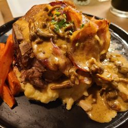 Stacy's Scratch Kitchen - Chestnut Mushroom & Boursin Stuffed Tomahawk Pork Chop.