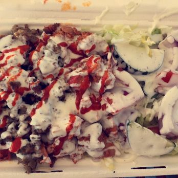 Hefty Gyros - Chicken/lamb combination rice platter with salad ($11). - Food Trucks Near Me