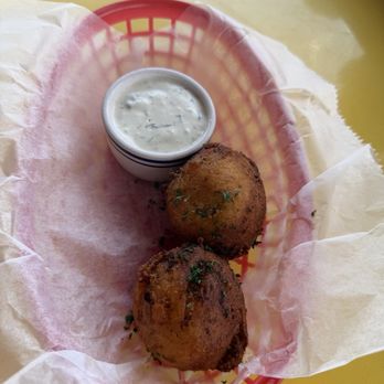 Millies Kitchen & Cocktails - Lobster Hush Puppies with homemade tartar sauce - Seafood Near Me - Houston, Texas Millies Kitchen & Cocktails - Lobster Hush Puppies with homemade tartar sauce - Seafood Near Me - Houston, Texas