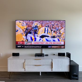 The Floating TV - 65" Samsung Q6 T.V mount - Home Theatre Installation Near Me The Floating TV - 65" Samsung Q6 T.V mount - Home Theatre Installation Near Me
