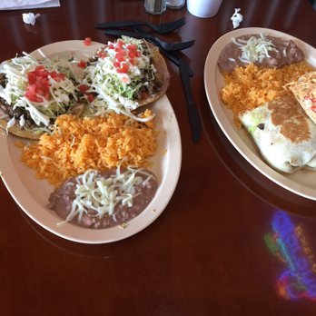 El Fuego - Tostado dinner plate (left) and Burrito plate (right) - Mexican Near Me - Algonquin, Illinois El Fuego - Tostado dinner plate (left) and Burrito plate (right) - Mexican Near Me - Algonquin, Illinois