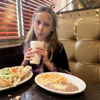 Plaza Del Sol - Happy kiddo with taco salad, beans, and rice. - Mexican Near Me - Jefferson, North Carolina Plaza Del Sol - Happy kiddo with taco salad, beans, and rice. - Mexican Near Me - Jefferson, North Carolina