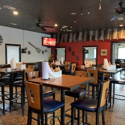 Robs Pit BBQ - Main dinning room. They offer booths, high-top tables, and standard table and chairs.