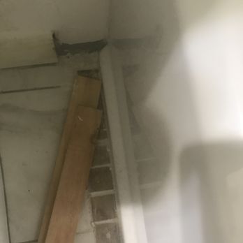 Ty The Handy Guy - This is the tiling job he did. The tiles are breaking over time even with boards over them. - Handyman Near Me