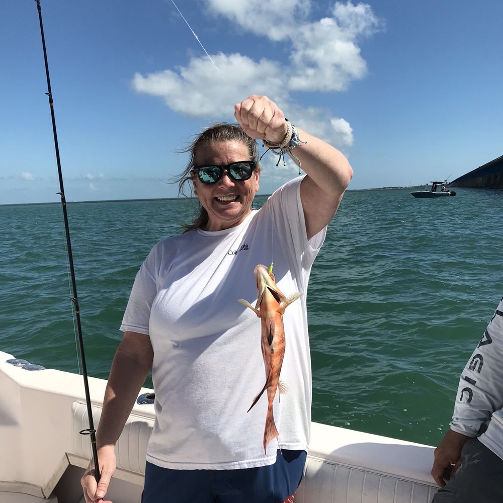 Hooked on the Keys - Sis catching her favorite but not the season to keep - Boat Charters Near Me - Marathon, Florida