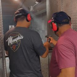 Self Defense Readiness Training - My dad helping my boyfriend with his first gun.