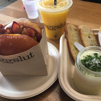 Eggslut - Bacon, egg and cheese sandwich. Slut. OJ - New American Near Me - Glendale, California