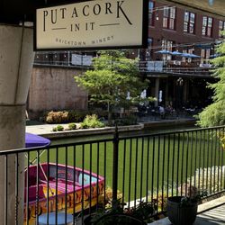 Put A Cork In It - Covered Patio seating out on the canal