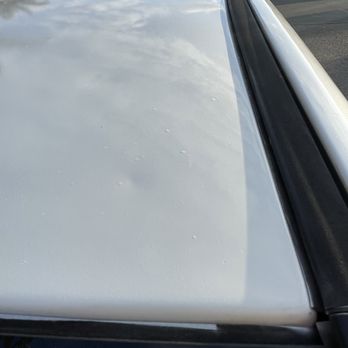 Prestige Auto Reconditioning - Let dents only worked on half the hood - Mobile Dent Repair Near Me