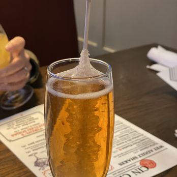 Cin Cin Burger BAR - Giggle Water. Champagne glass with Prosecco, bitters, and rock candy - Burgers Near Me - Winston-Salem, North Carolina Cin Cin Burger BAR - Giggle Water. Champagne glass with Prosecco, bitters, and rock candy - Burgers Near Me - Winston-Salem, North Carolina