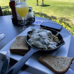 Peter's on the Green - Daily special - cheese steak omellette on skillet