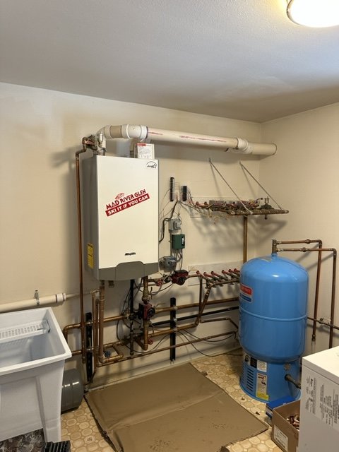 Slide of Carlos' Plumbing and Heating