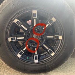 Missing hubcap, Bolts intact Missing hubcap, Bolts intact
