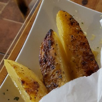 Flaming Cheese Saganaki - Greek potatoes - a side choice with the gyro - Greek Near Me - Dallas, Texas