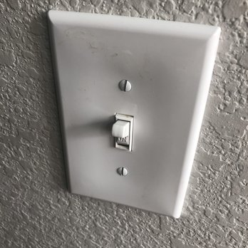 Queen of Maids - Another light switch on the 2nd floor covered in dirt and residue - Home Cleaning Near Me Queen of Maids - Another light switch on the 2nd floor covered in dirt and residue - Home Cleaning Near Me