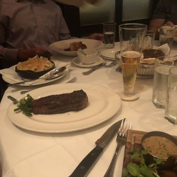 The Capital Grille - New York strip steak and a side of lobster Mac and cheese - Steakhouses Near Me - Burlington, Massachusetts The Capital Grille - New York strip steak and a side of lobster Mac and cheese - Steakhouses Near Me - Burlington, Massachusetts