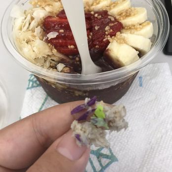 Lanikai Juice - Plastic wrapper blended into açaí bowl !! - Juice Bars & Smoothies Near Me - Honolulu, Hawaii