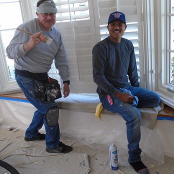 Pella Windows and Doors Showroom of San Diego, CA - Santos (left) and Francisco (right) apply finishing touches including paint. - Windows Installation Near Me - San Diego, California