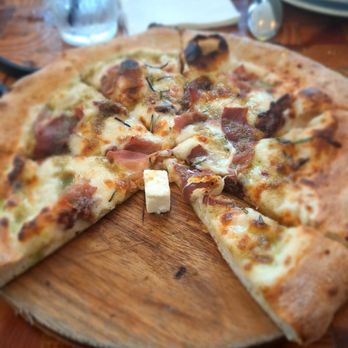 d’Alba - Pizza with a cube of goat cheese from the cheese board - New American Near Me - Houston, Texas d’Alba - Pizza with a cube of goat cheese from the cheese board - New American Near Me - Houston, Texas