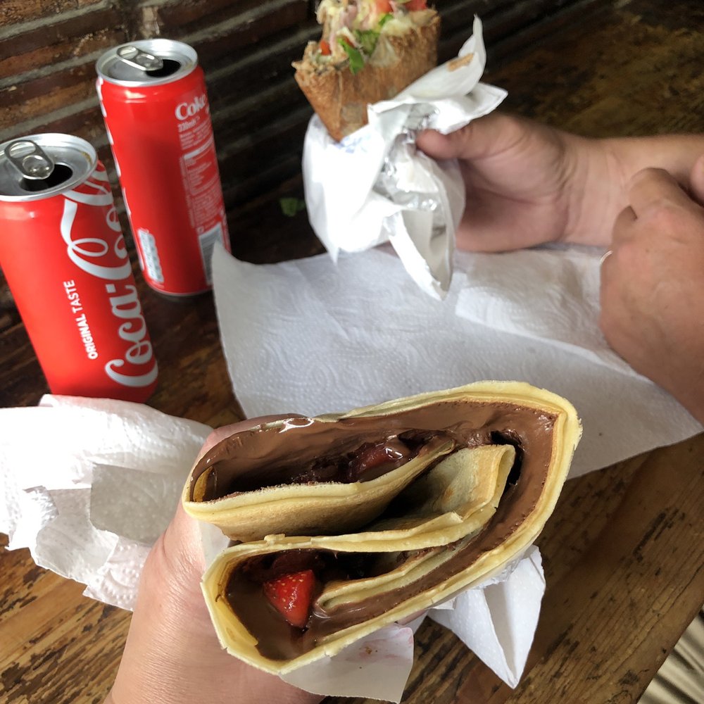Au P'tit Grec - Total 15€ with a tip Nutella and strawberrys and a savory crepe in the back ground - Creperies Near Me - Paris, 75 Au P'tit Grec - Total 15€ with a tip Nutella and strawberrys and a savory crepe in the back ground - Creperies Near Me - Paris, 75