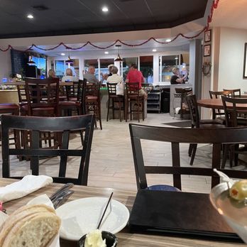 Abby's on Miami - a dining area with tables and chairs - American Near Me - Venice, Florida
