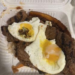 Piolin Jr Restaurant - Steak missing yoke in egg sad to open a plate like this
