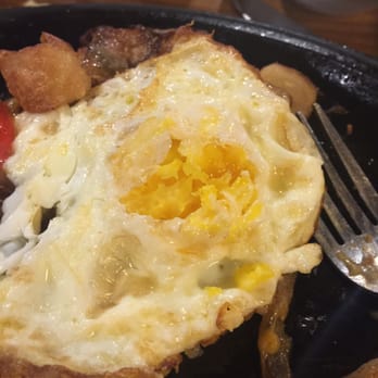 Denny's - An "over easy" egg, with hardened yolk - Breakfast & Brunch Near Me - Duarte, California Denny's - An "over easy" egg, with hardened yolk - Breakfast & Brunch Near Me - Duarte, California