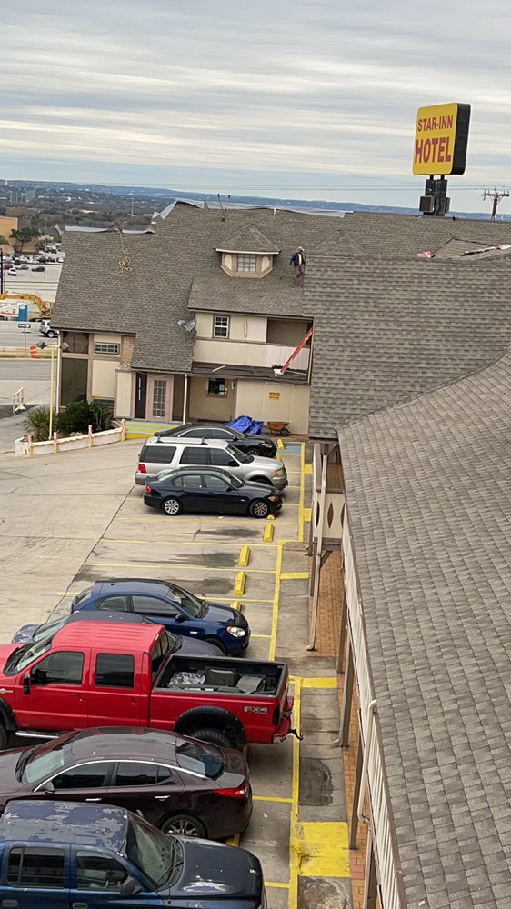 Slide of DE AL Roofing