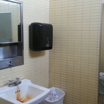 Dandy - a bathroom with a sink and toilet - Convenience Stores Near Me - Chemung, New York Dandy - a bathroom with a sink and toilet - Convenience Stores Near Me - Chemung, New York