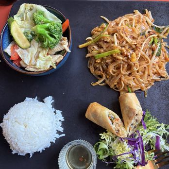 Toma Sushi Restaurant and Bar - Pad Thai, stir fried vegetable upper left bowl, egg roll, rice, salad - Japanese Near Me - Kenmore, Washington