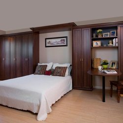 The Tailored Closet of South Jersey - Space-saving never looked so good.  Murphy beds give you a guest-ready room that tucks away with ease...