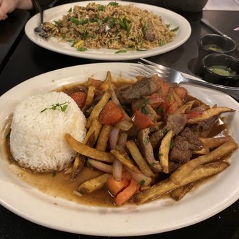 Lima Peruvian Restaurant - Lomo saltado (front) and Chaufa de Carne (back) - Peruvian Near Me - Beaverton, Oregon Lima Peruvian Restaurant - Lomo saltado (front) and Chaufa de Carne (back) - Peruvian Near Me - Beaverton, Oregon