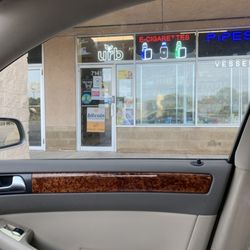 Smokedale Tobacco - No idea if they're open but Apple Maps says 8am-2am for today and ive been here since around 7:52am.