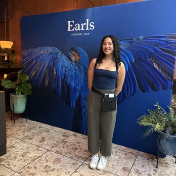 Earls Kitchen + Bar - The incredible team member accompanied by Earl's mascot - New American Near Me - Miami, Florida Earls Kitchen + Bar - The incredible team member accompanied by Earl's mascot - New American Near Me - Miami, Florida