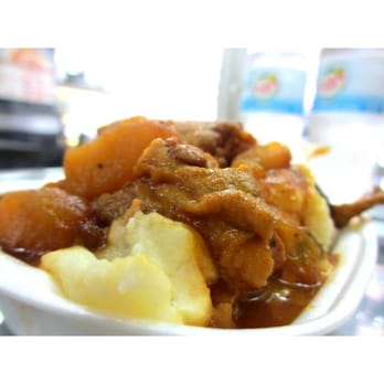 Punta Cana Coffee Shop & Restaurant - Stewed chicken over mashed potatoes. - Mexican Near Me - Brooklyn, New York Punta Cana Coffee Shop & Restaurant - Stewed chicken over mashed potatoes. - Mexican Near Me - Brooklyn, New York