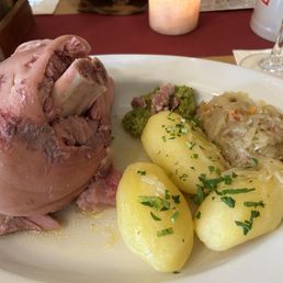 pork knuckle, pea mash, sauerkraut, potatoes