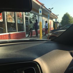 McDonald's - The door says the lobby opens at 6AM! 4 people, 2 of them my kids, waiting for door to open at 7:27AM.