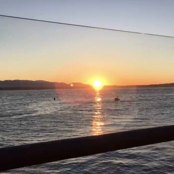 Ray's Boathouse - Beautiful sun setting - New American Near Me - Seattle, Washington Ray's Boathouse - Beautiful sun setting - New American Near Me - Seattle, Washington
