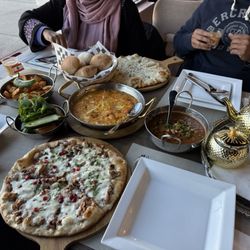 Mama Mona Cuisine - Lebanese Shakshuka, Mama Mona mix Cheese manakish, Musakhan Chicken manakish, Foul Mama Mona