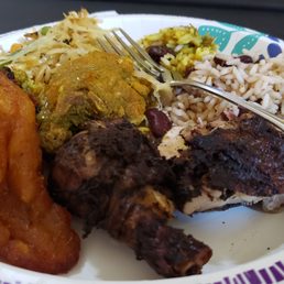 Jerk Chicken/Curry Chicken and some tasty side dishes...and that plantain! Jerk Chicken/Curry Chicken and some tasty side dishes...and that plantain!