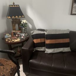 The brown leather sofa and Knick knacks I bought from Penny wise!