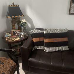 Pennywise Resale Center - The brown leather sofa and Knick knacks I bought from Penny wise!