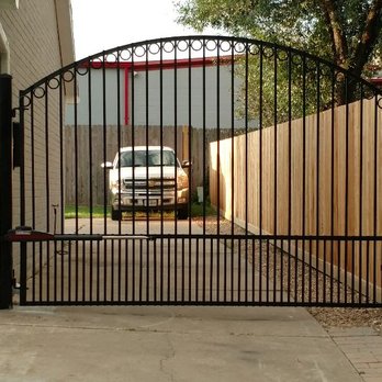 Premier Automated Gates - 10' swing gate with a single arch, doggie bars across the bottom with a Liftmaster LA400 installed. - Home Services Near Me - Brookshire, Texas Premier Automated Gates - 10' swing gate with a single arch, doggie bars across the bottom with a Liftmaster LA400 installed. - Home Services Near Me - Brookshire, Texas