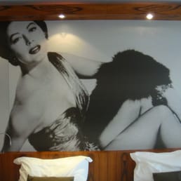 Hotel room décor- Photo art at head of bed.