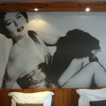 JW Marriott Cannes - Hotel room décor- Photo art at head of bed. - Hotels Near Me - Cannes, 06